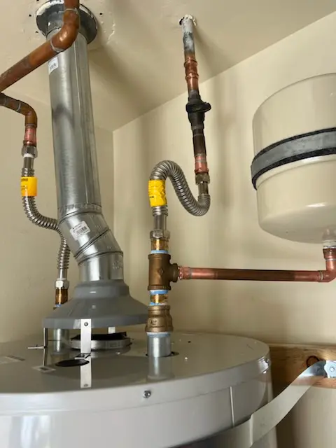 Water heater installation and plumbing repair in Timber
